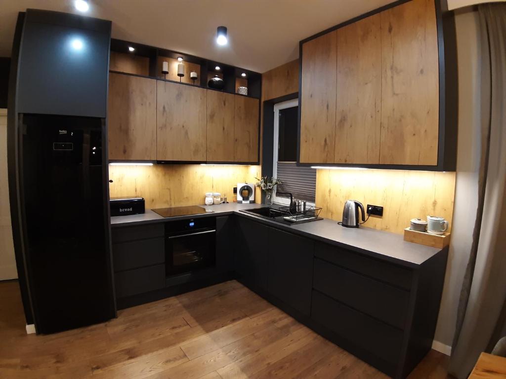 Kuchyňa alebo kuchynka v ubytovaní Lux-house Braniewo