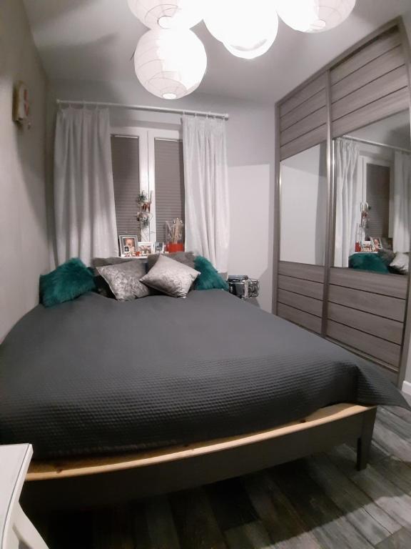Posteľ alebo postele v izbe v ubytovaní Lux-house Braniewo