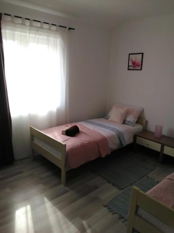 Posteľ alebo postele v izbe v ubytovaní Apartman Periska