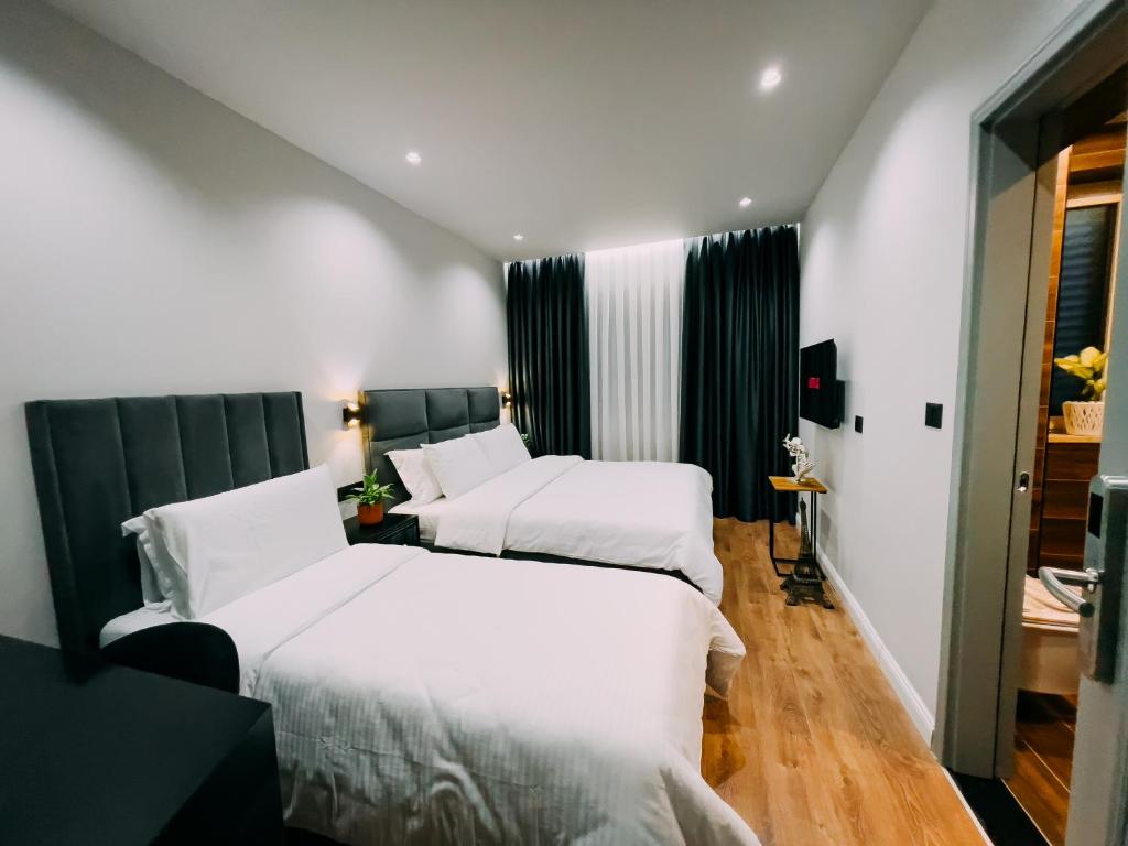 Postel nebo postele na pokoji v ubytování Imperator Hotel