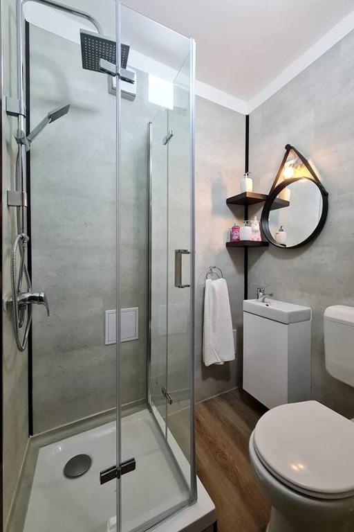 Łazienka w obiekcie Wandorf 125 Apartman