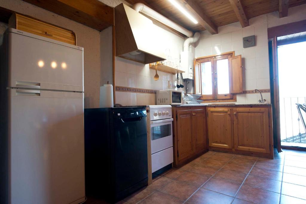 Kuchyň nebo kuchyňský kout v ubytování Casa Sinera - L'Amfitriona
