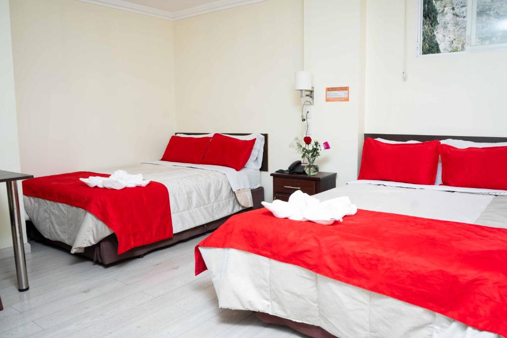 Postel nebo postele na pokoji v ubytování Hotel Loja Bella