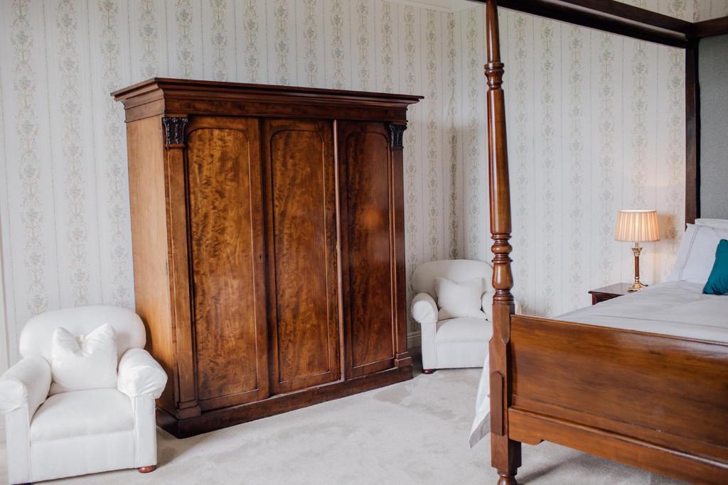 Postel nebo postele na pokoji v ubytování Noan Country House B&B