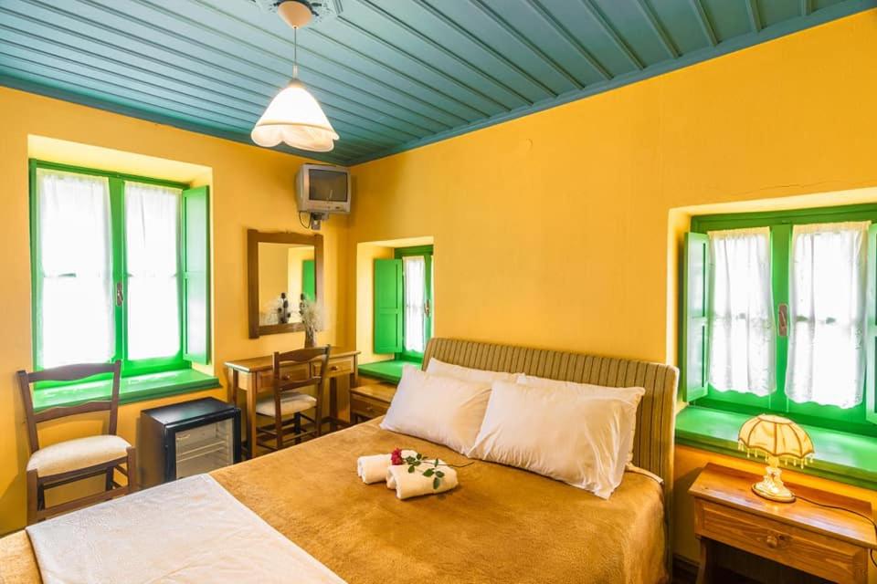 Postel nebo postele na pokoji v ubytování Morfeas Guesthouse