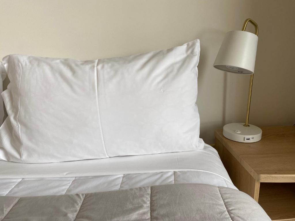 Postel nebo postele na pokoji v ubytování Motel On York