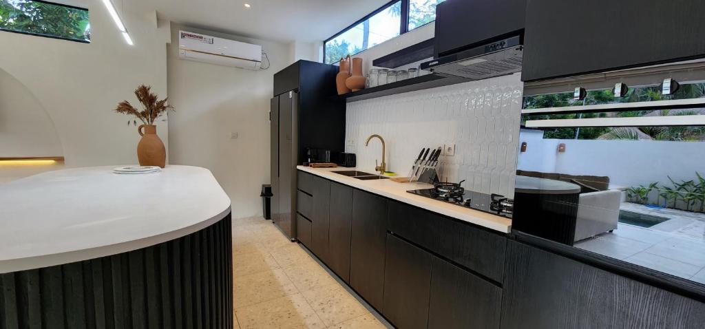 Dapur atau dapur kecil di Tiu Oasis Lombok