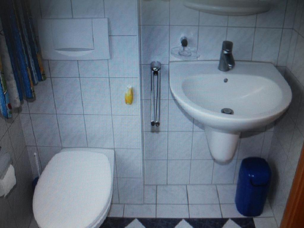 Koupelna v ubytování Haus Seestern