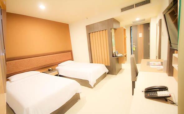 Postel nebo postele na pokoji v ubytování Hotel Olive
