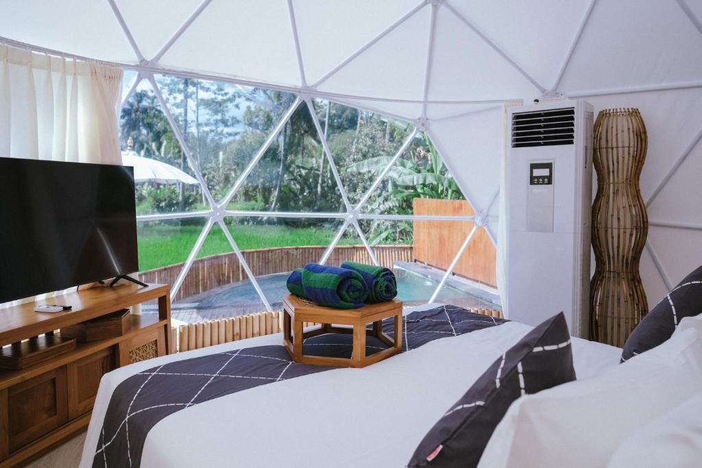 Postel nebo postele na pokoji v ubytování Triyana Resort and Glamping