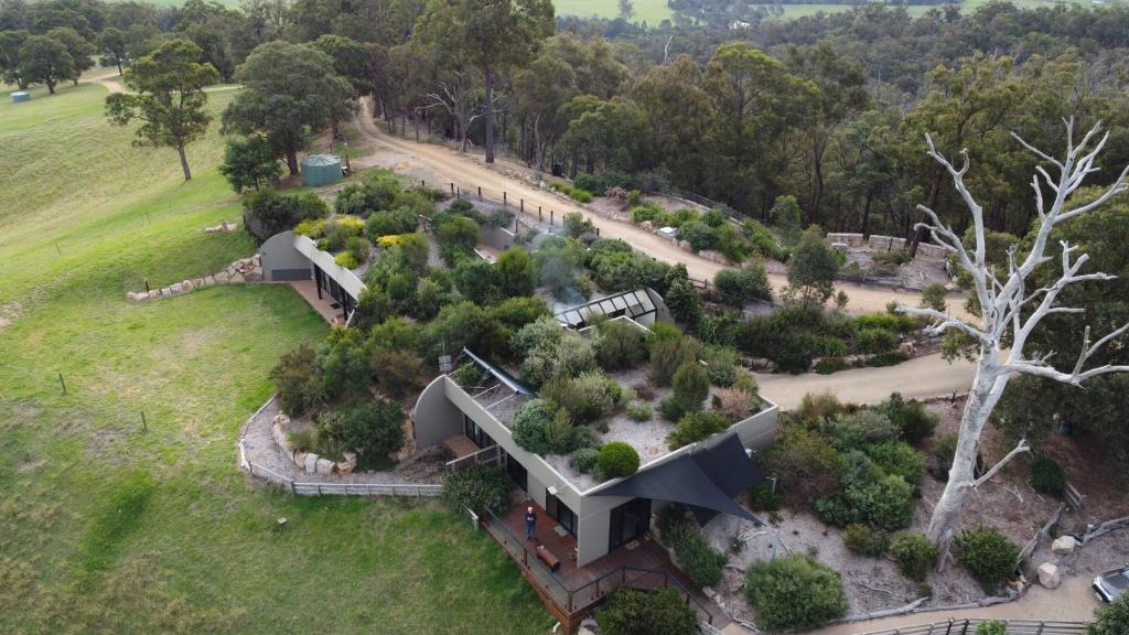 an aerial view of a house with a garden at Down to Earth Farm Retreat in Sarsfield