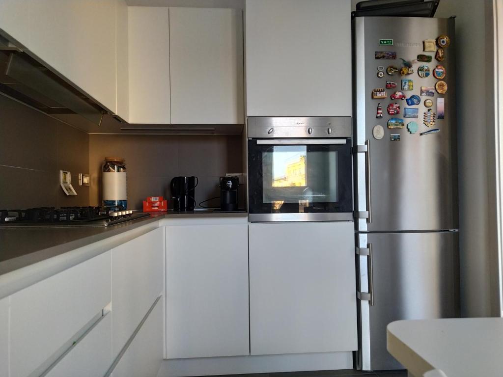 A kitchen or kitchenette at B&B Markone Bologna Center