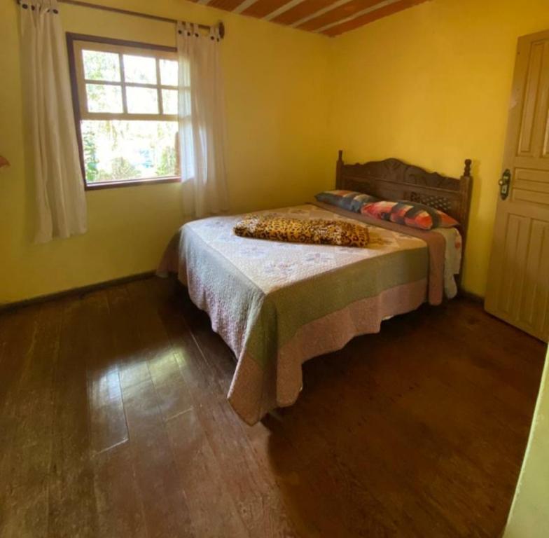 Posteľ alebo postele v izbe v ubytovaní Casa das mandalas Lavras Novas