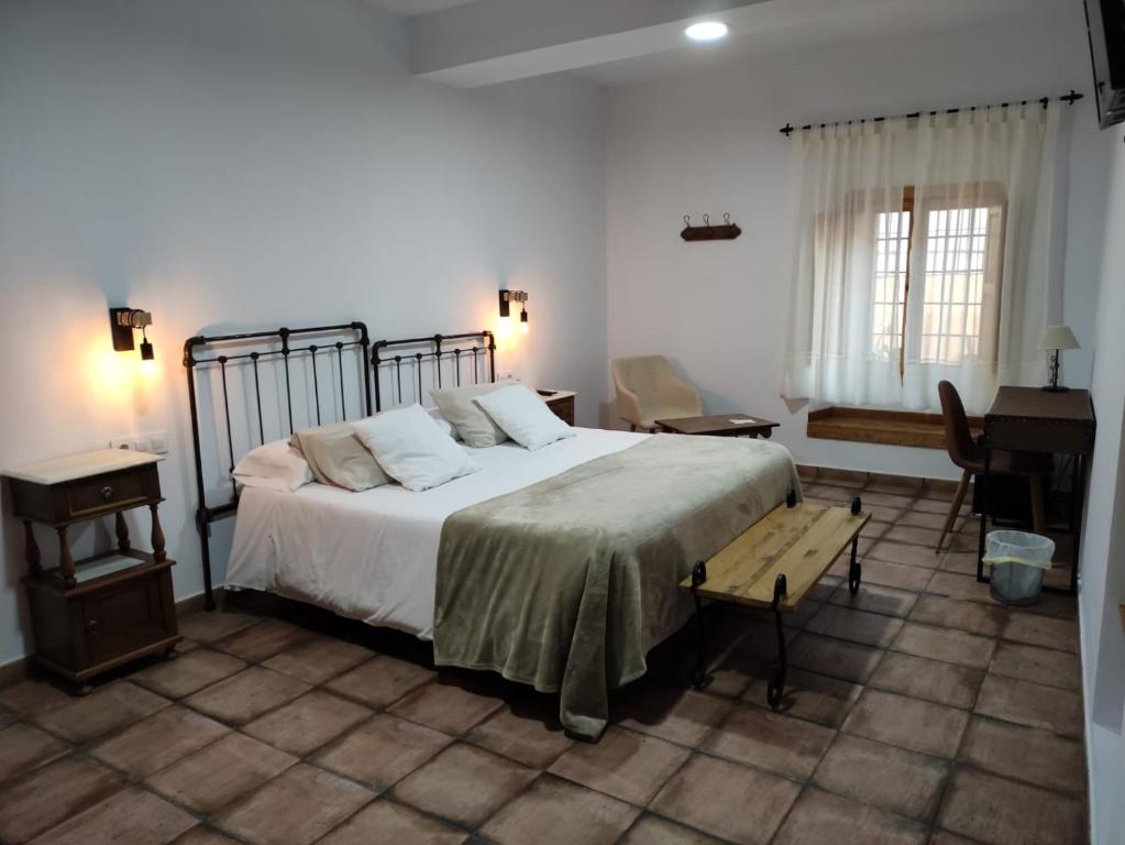 Postel nebo postele na pokoji v ubytování Casa Rural el Rincón de Monfragüe