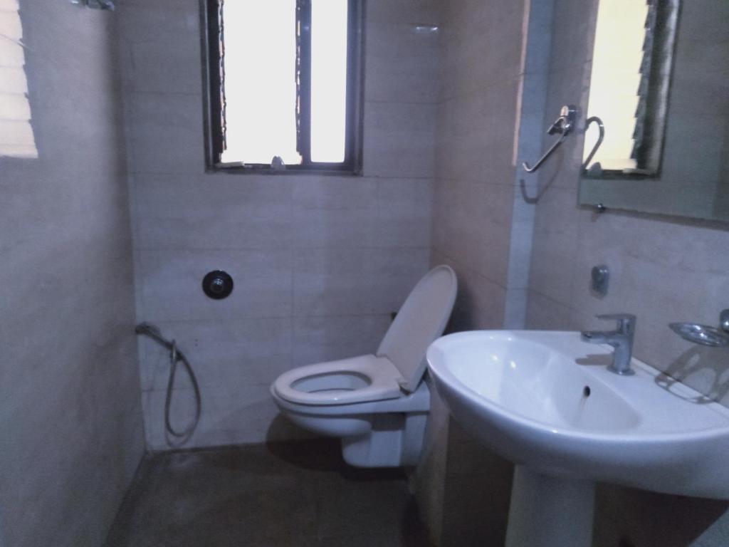 Koupelna v ubytování Sai Heera Residency Shirdi