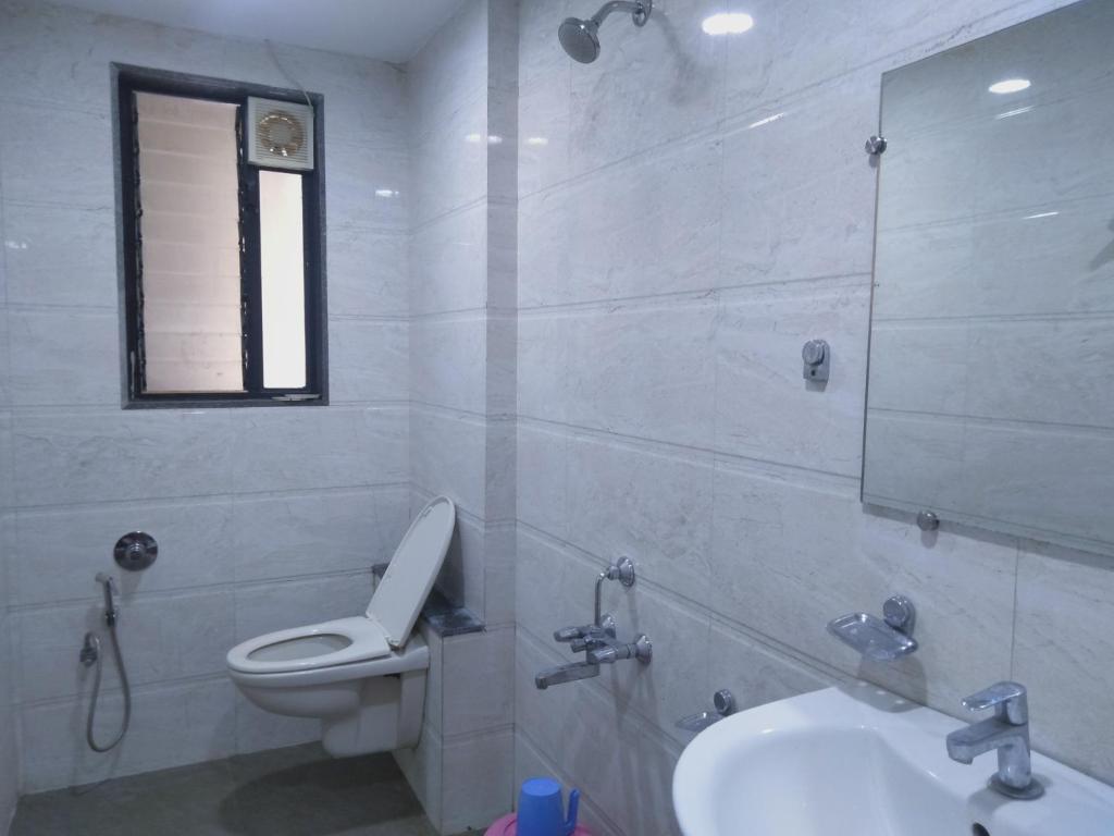 Koupelna v ubytování Sai Heera Residency Shirdi