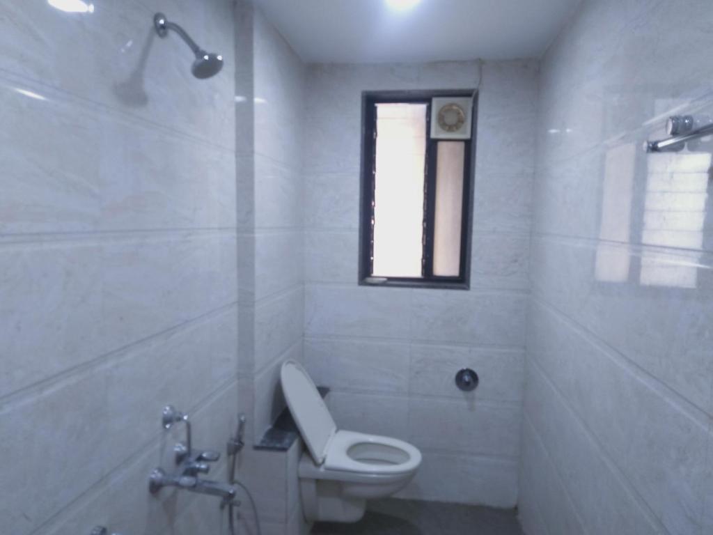 Koupelna v ubytování Sai Heera Residency Shirdi