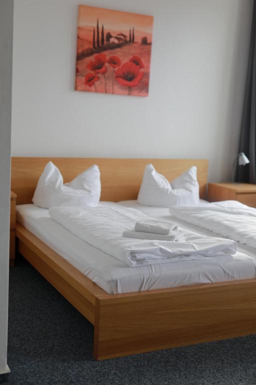 Postel nebo postele na pokoji v ubytování Hotel zur Börse