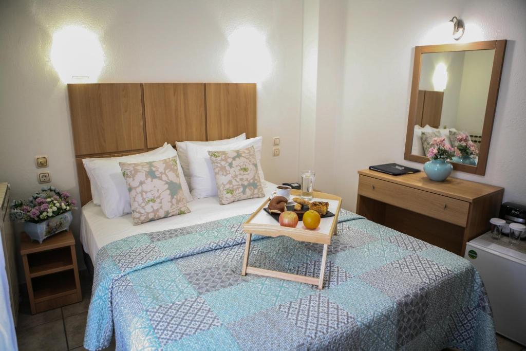 Postel nebo postele na pokoji v ubytování Hotel Karagianni