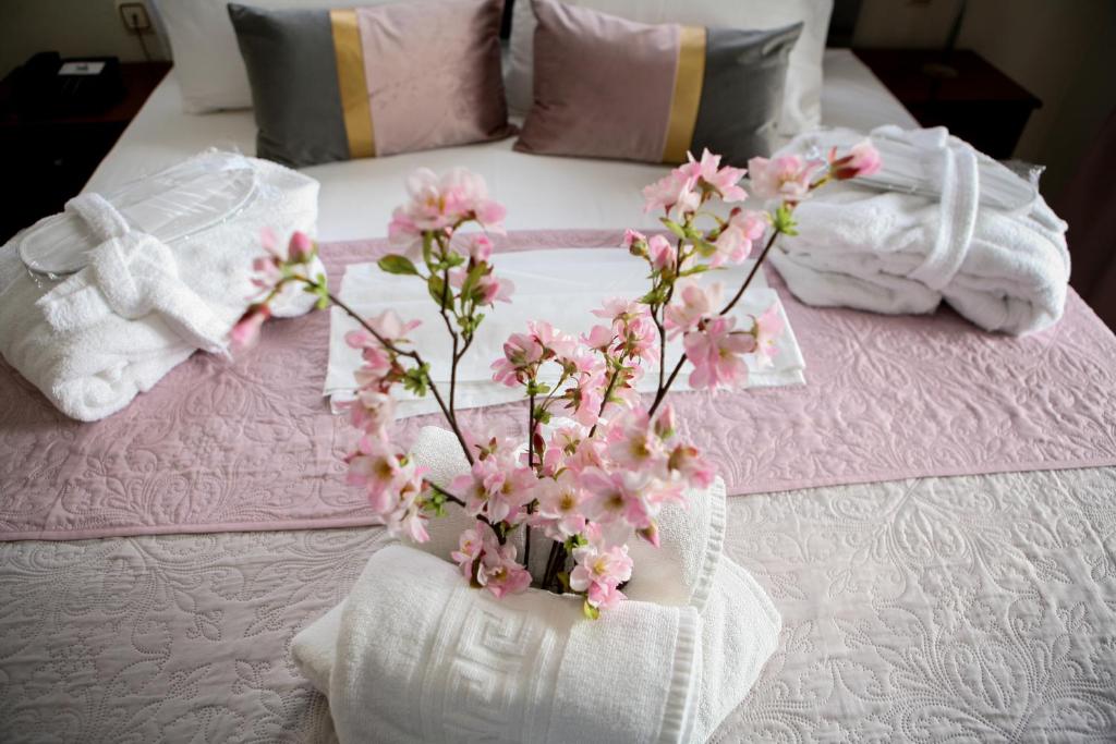 Postel nebo postele na pokoji v ubytování Hotel Karagianni