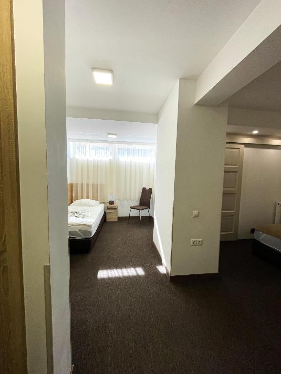 Posteľ alebo postele v izbe v ubytovaní Öreg-tó Hotel és Rendezvénytér