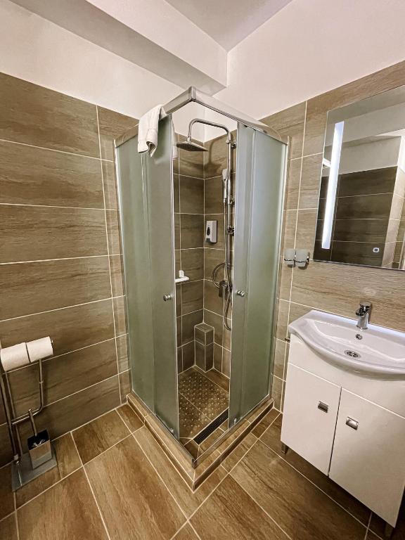 Kúpeľňa v ubytovaní Öreg-tó Hotel és Rendezvénytér
