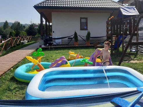 Herní místnost nebo prostor pro děti v ubytování Domki Solina Róża Wiatrów
