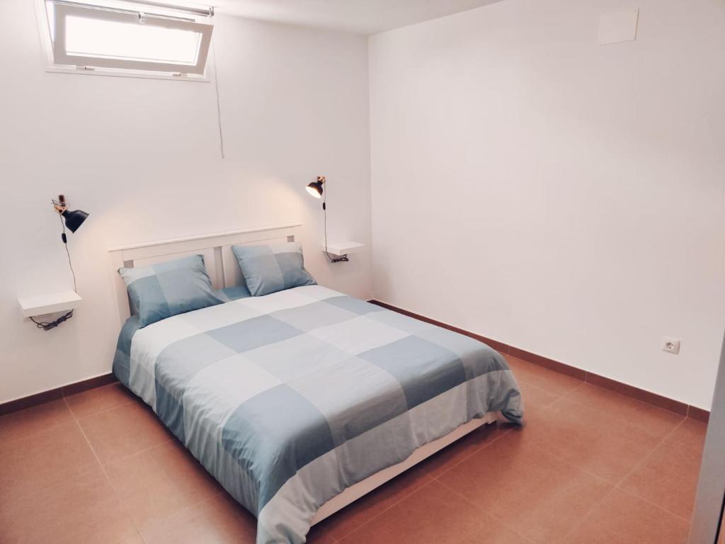 Postel nebo postele na pokoji v ubytování Casa Felicidad