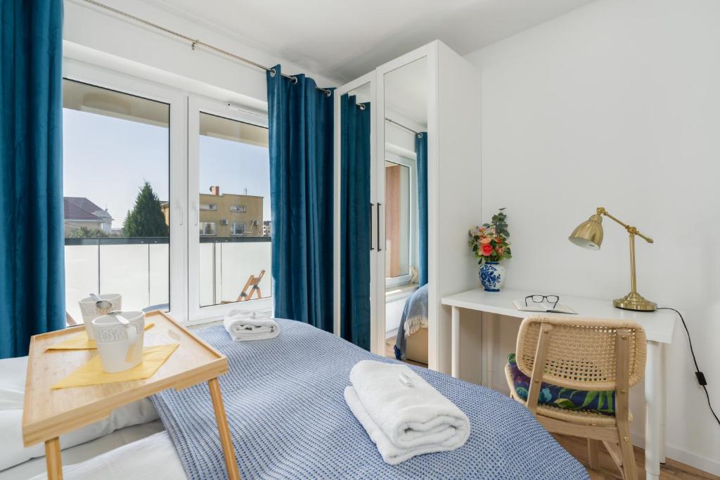 Posteľ alebo postele v izbe v ubytovaní Rezydencja Rejtana with FREE GARAGE Poznań by Noclegi Renters