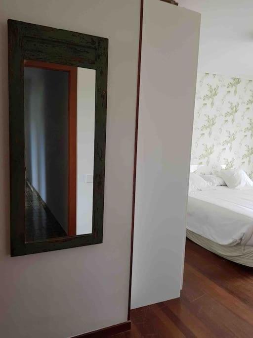 A bed or beds in a room at Perfect Chalet for Beach Lovers and Golfers