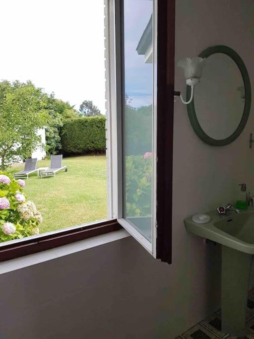 A garden outside Perfect Chalet for Beach Lovers and Golfers