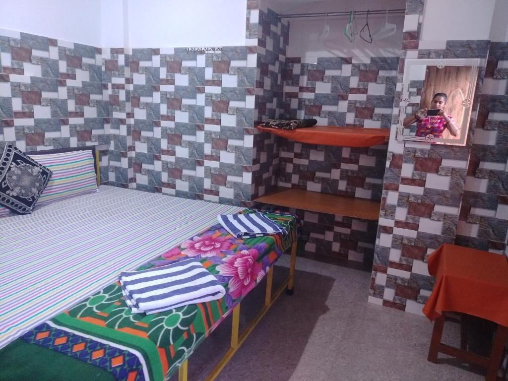 Postel nebo postele na pokoji v ubytování Baga F Leisure Stay Guest House