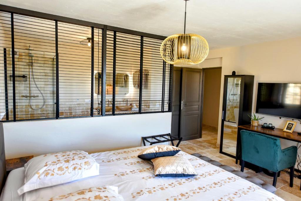 Postel nebo postele na pokoji v ubytování Chambre d'hôtes Cottes