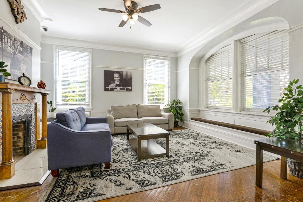 a living room with a couch and a fireplace at Newly-renovated Express Studios Close to City Amenities in New Orleans