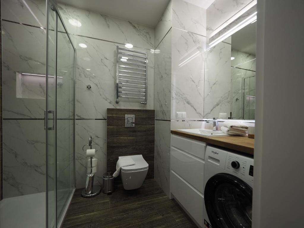 Kúpeľňa v ubytovaní VIP Apartamenty Modrzejewska Residence