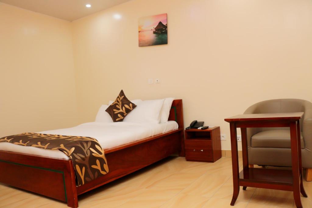 Postel nebo postele na pokoji v ubytování HOTEL LAVAL