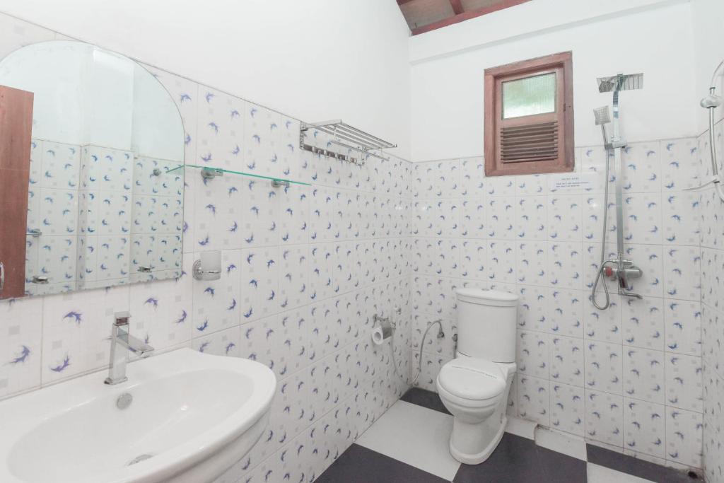 Koupelna v ubytování Wathsala Inn