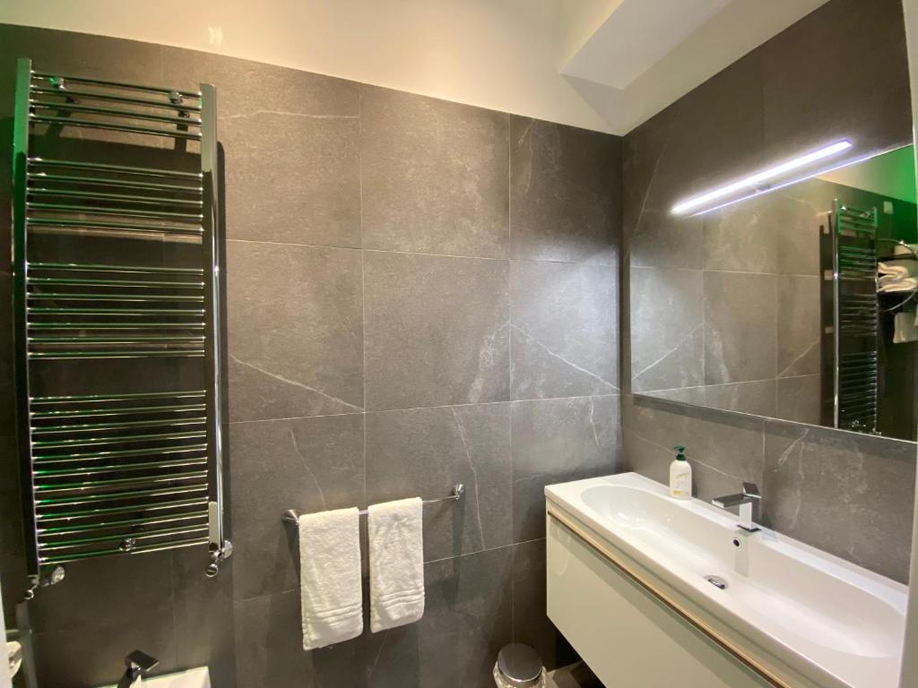 Koupelna v ubytování Residenze Romano Ristorante & SPA albergo diffuso - WHITE