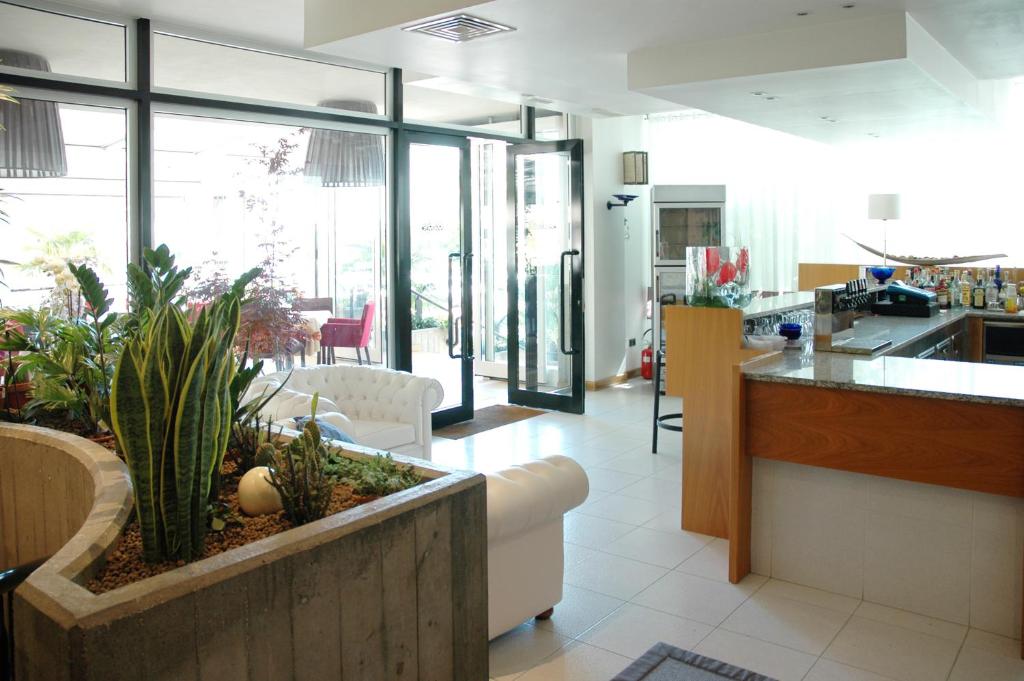 Kuchyň nebo kuchyňský kout v ubytování Hotel Santiago
