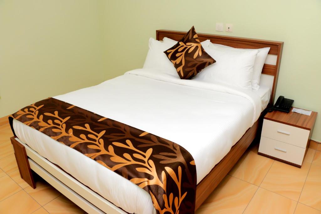 Postel nebo postele na pokoji v ubytování HOTEL LAVAL
