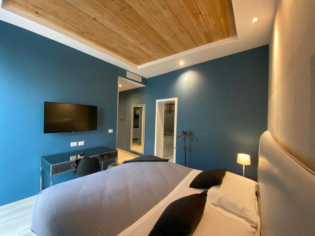 TV a/nebo společenská místnost v ubytování Residenze Romano Ristorante & SPA albergo diffuso - WHITE
