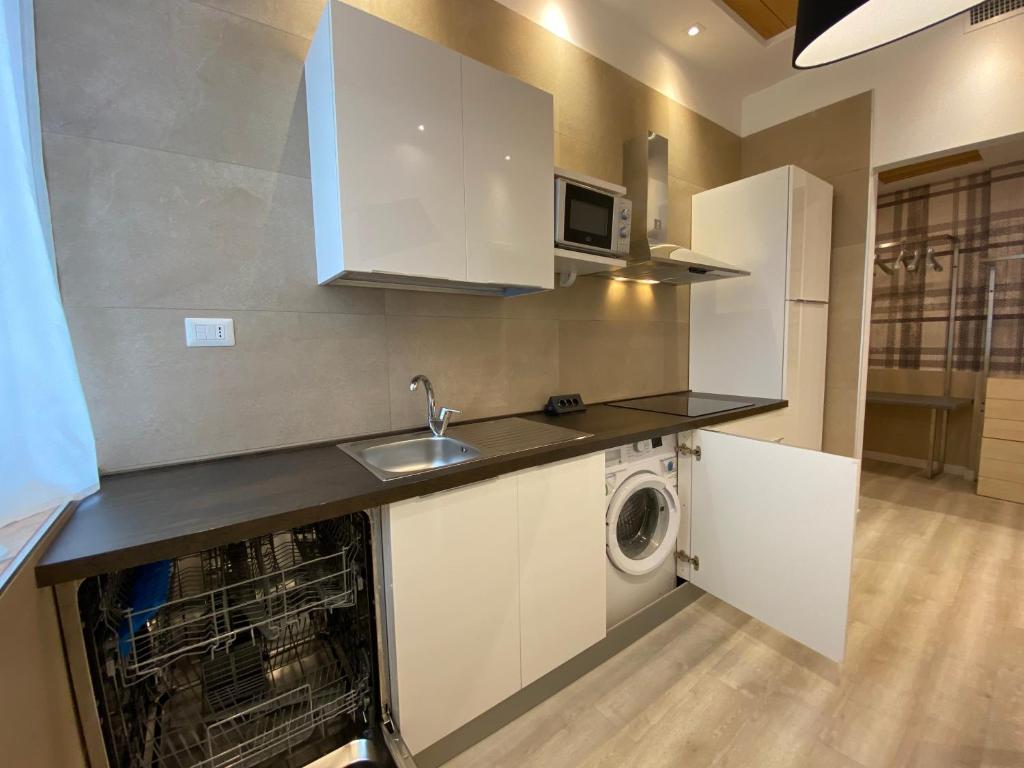 Kuchyň nebo kuchyňský kout v ubytování Residenze Romano Ristorante & SPA albergo diffuso - WHITE