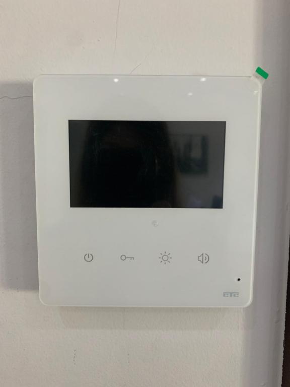 Televízia a/alebo spoločenská miestnosť v ubytovaní Olvias Apartment