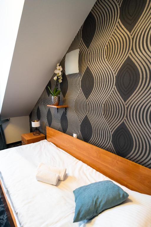 Ein Bett oder Betten in einem Zimmer der Unterkunft Hotel SANVIT RESTAURACJA & SPA