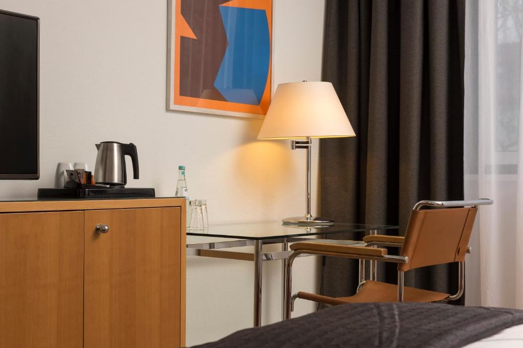 Postel nebo postele na pokoji v ubytování Holiday Inn Berlin City-West by IHG