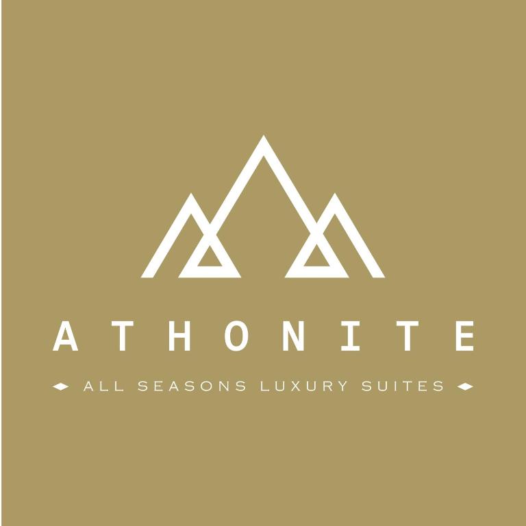 a logo for a furniture store with a mountain at ATHONITE all seasons luxury suites in Ierissos