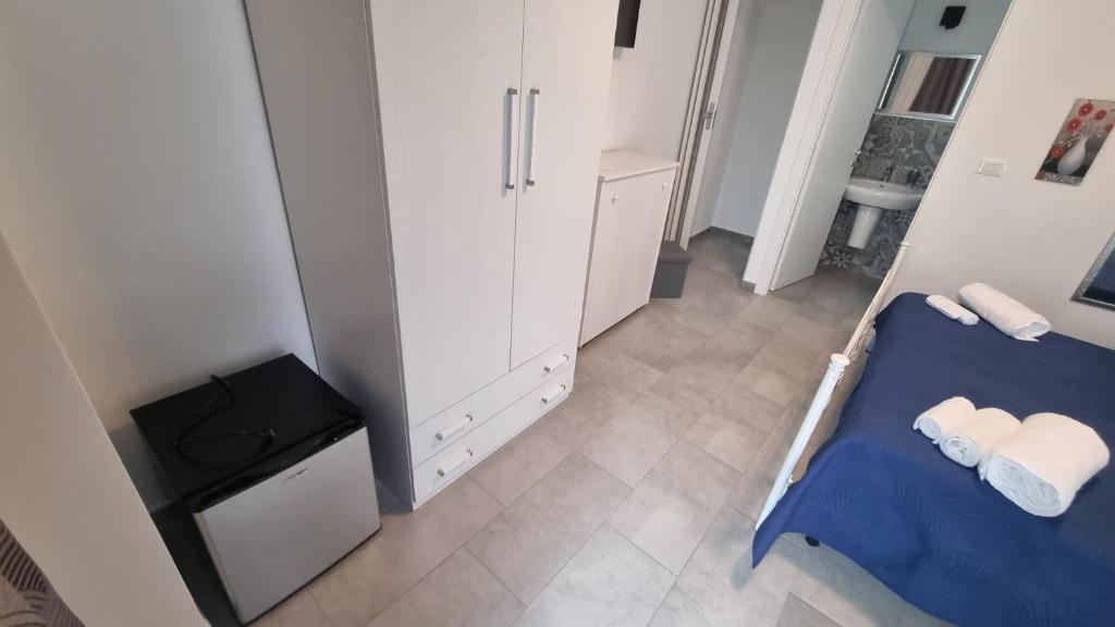 Posteľ alebo postele v izbe v ubytovaní The Simo's House Camere a Marzamemi