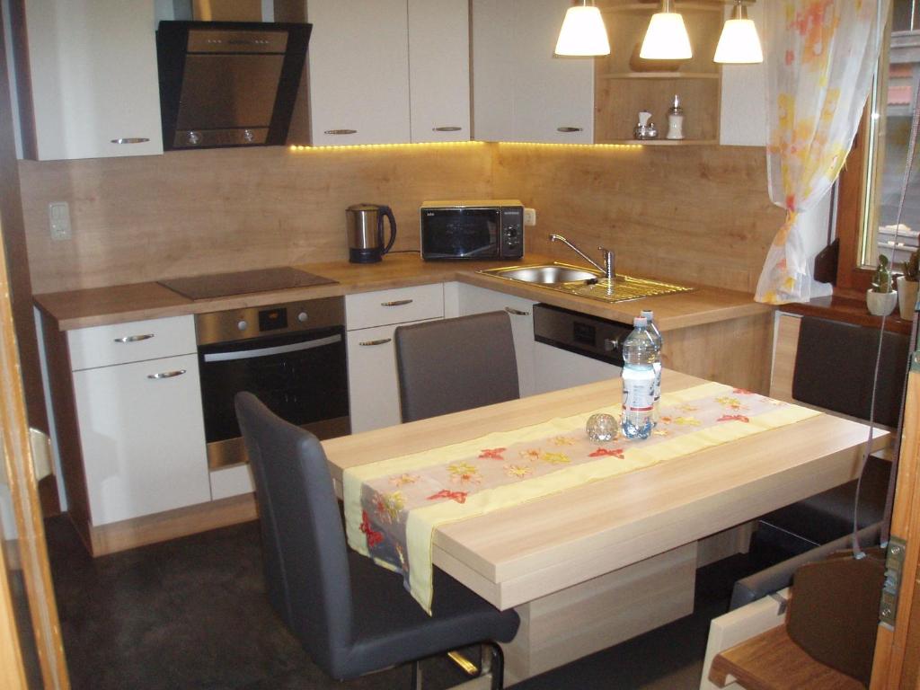Kuchyňa alebo kuchynka v ubytovaní Appartement Harmonie