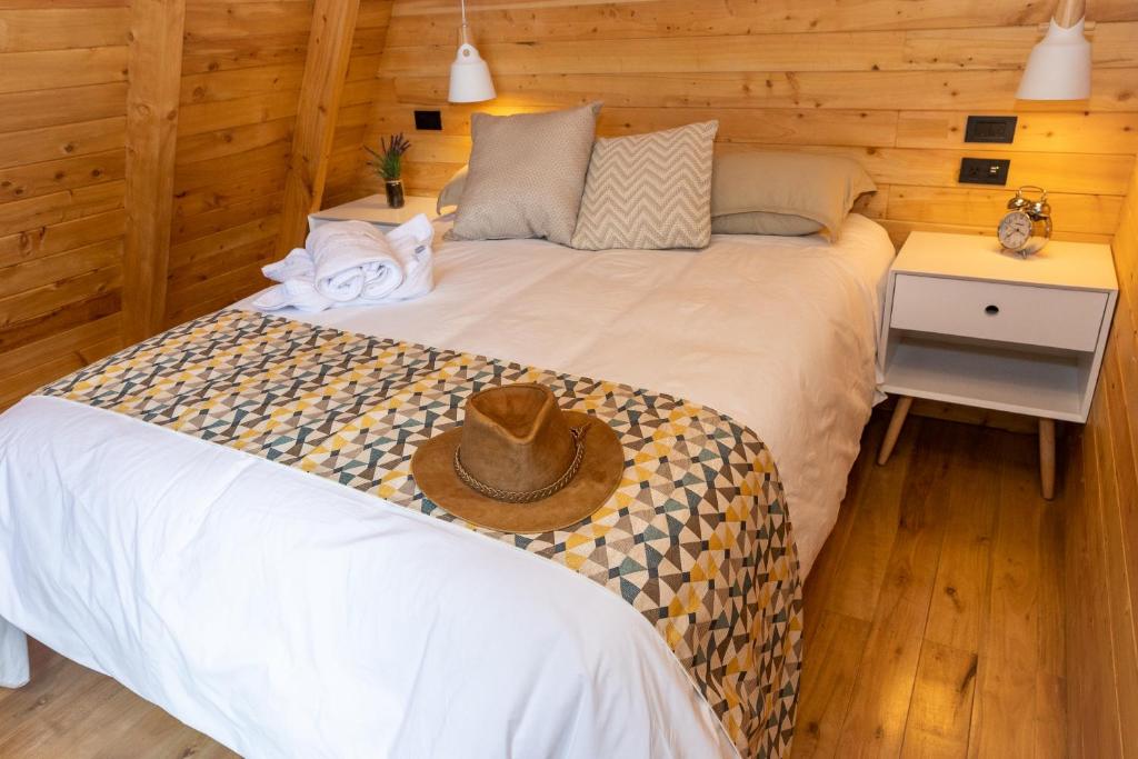 Postel nebo postele na pokoji v ubytování Hosteria Papagayo Cotopaxi