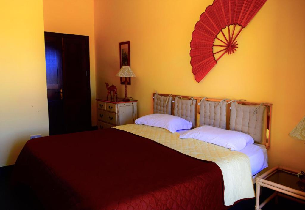 Katil atau katil-katil dalam bilik di Gmiel in-Natura B&B